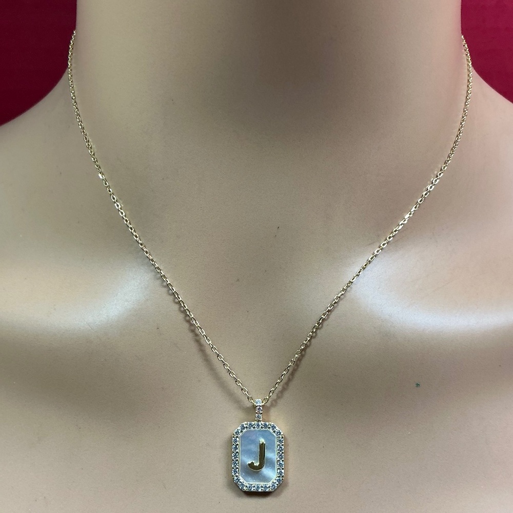 Sterling Silver gold tone letter J pendant with clear stones. 16 to 18”